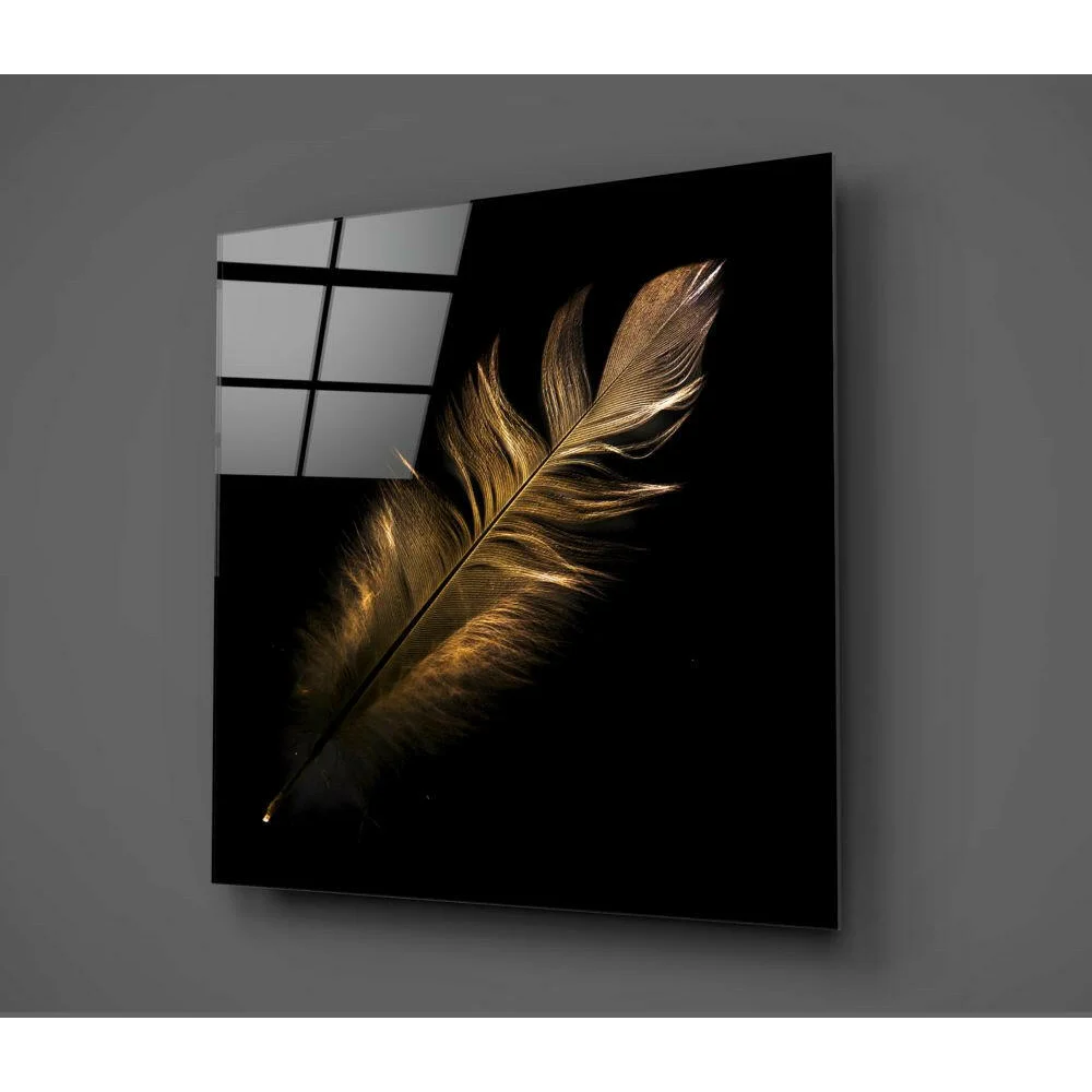 Sleek black glass wall art panel with stunning golden feather design