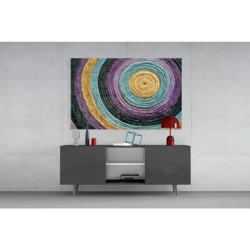 Vibrant textured circular wall art in purple teal and gold