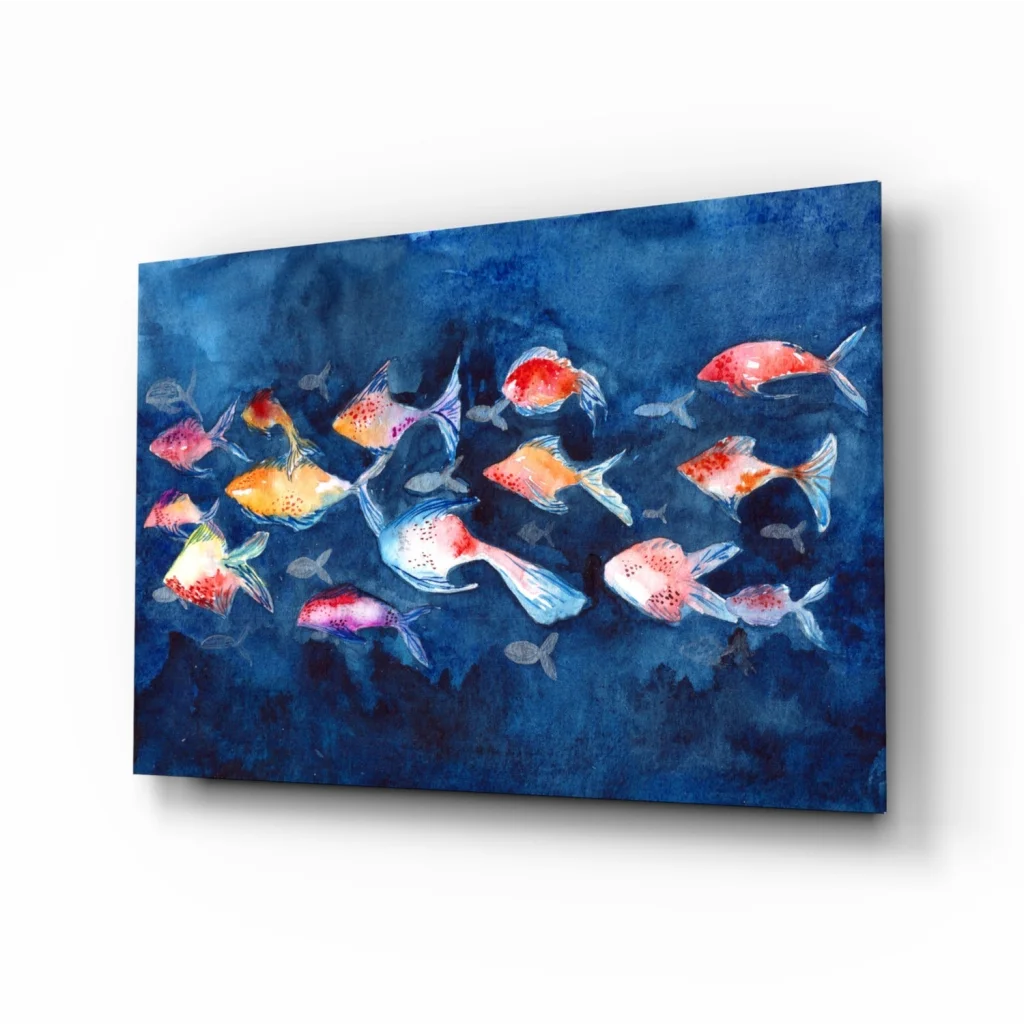 Vibrant watercolor fish school in glass wall art on deep blue canvas