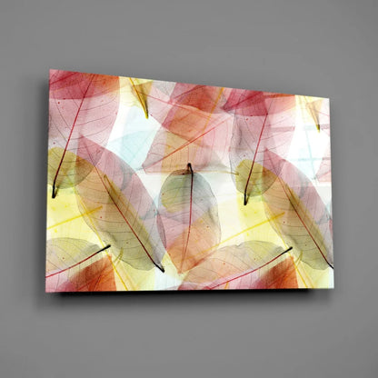 Translucent leaf glass wall art in pink, orange, yellow tones
