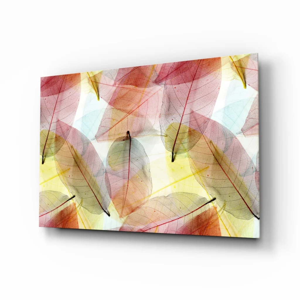 Translucent leaf glass wall art in pink, orange, yellow tones