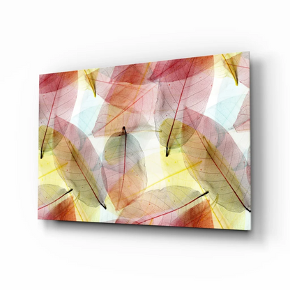 Translucent leaf glass wall art in pink, orange, yellow tones