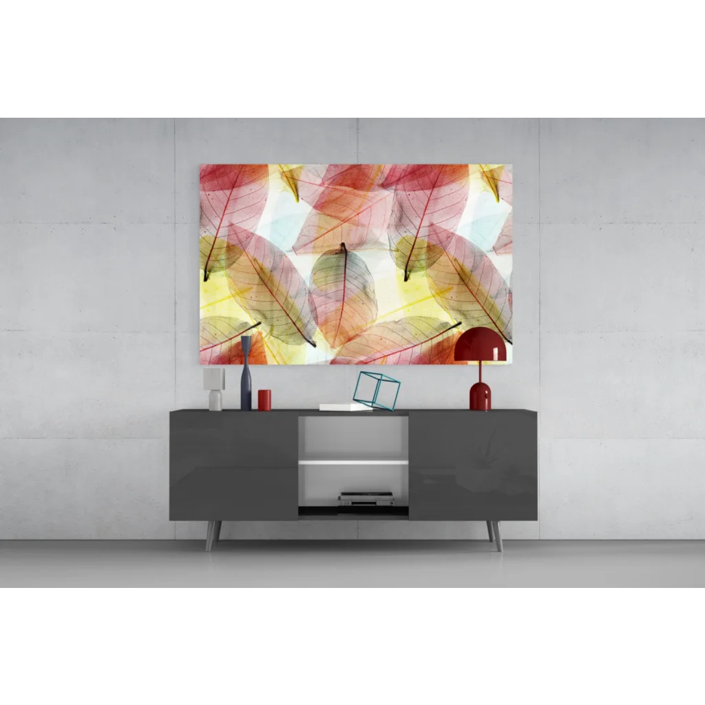 Vibrant translucent leaf glass wall art in pink, red, yellow tones