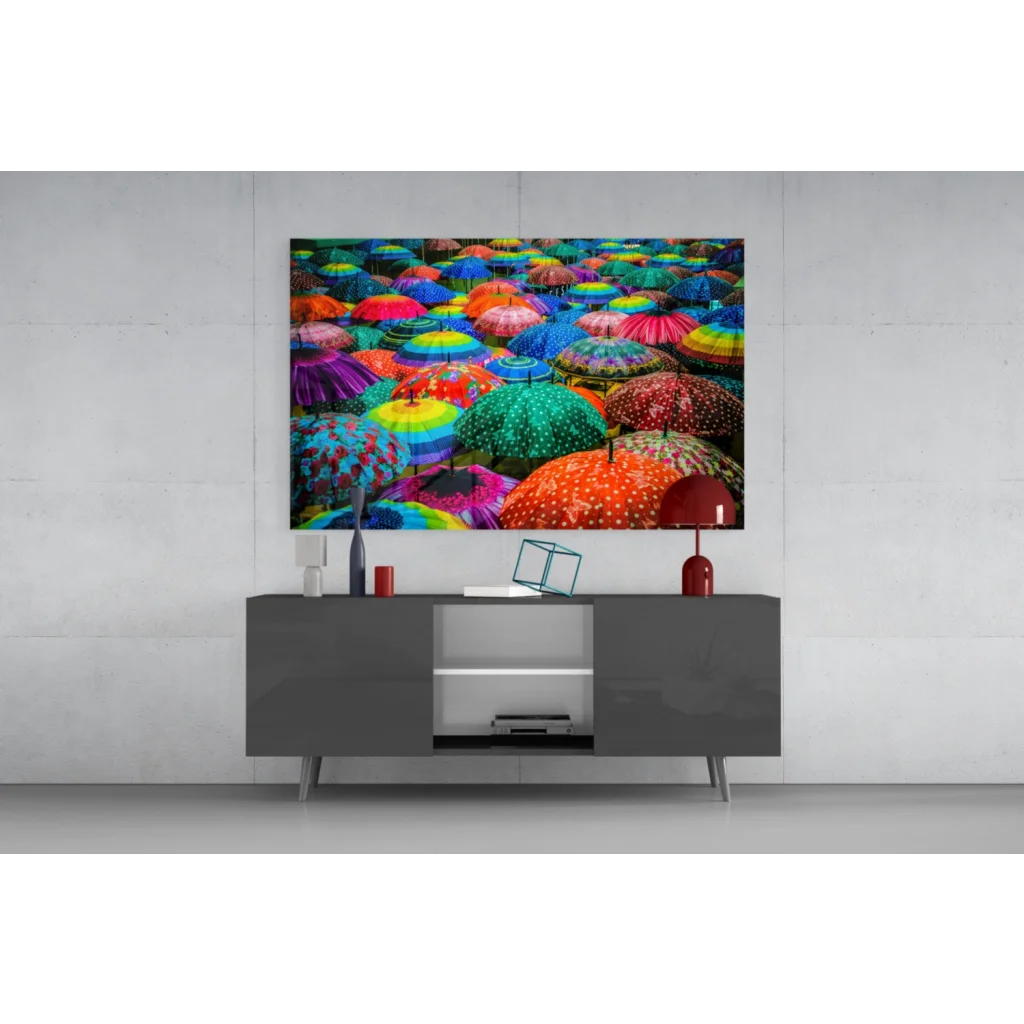 Vibrant rainbow umbrellas glass wall art print on gray console