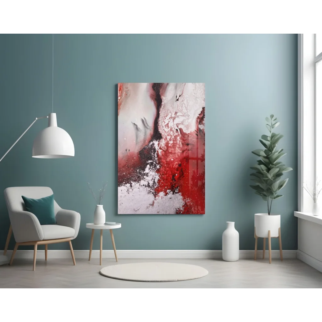 Vibrant bold red swirl glass wall art with glitter accents on teal wall