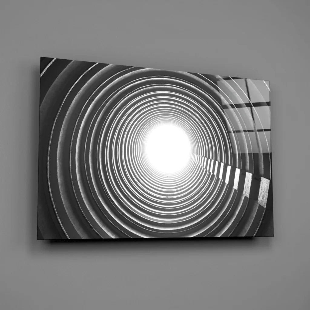 Black-and-white concentric circles canvas wall art with bright light center