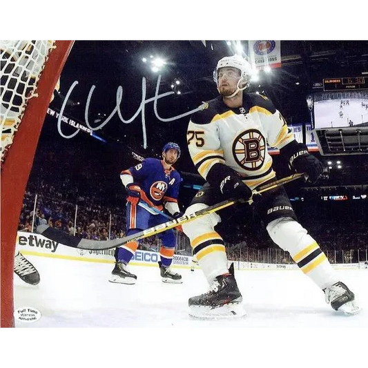 Autographed Connor Clifton Boston Bruins 8x10 photo with COA of Bruins and Islanders on ice