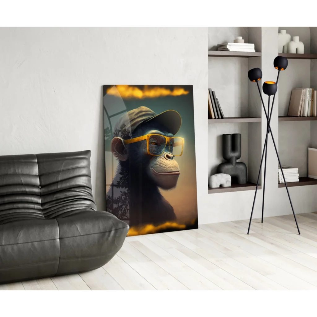 Cool monkey wall art on canvas with gold sunglasses and black leather couch