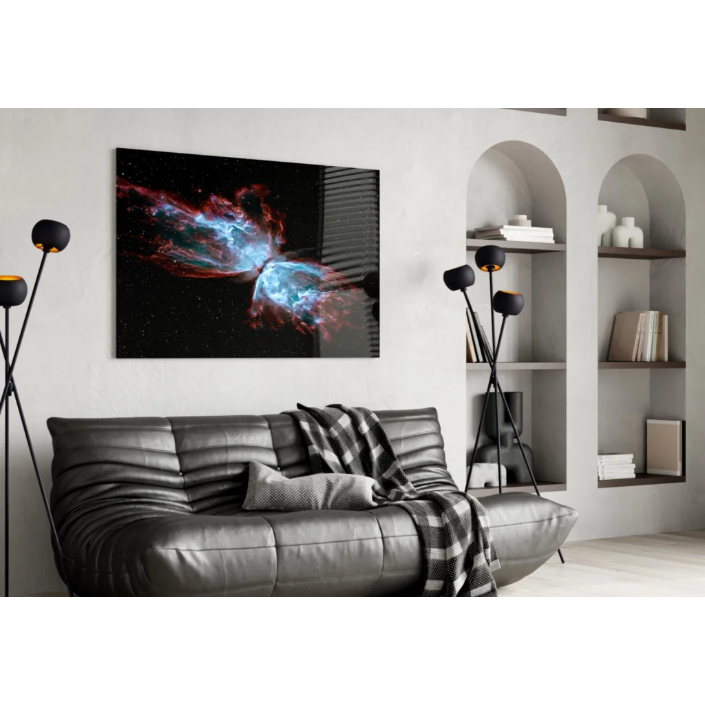 Black leather sofa with checkered throw and vivid red blue cosmic butterfly nebula wall art