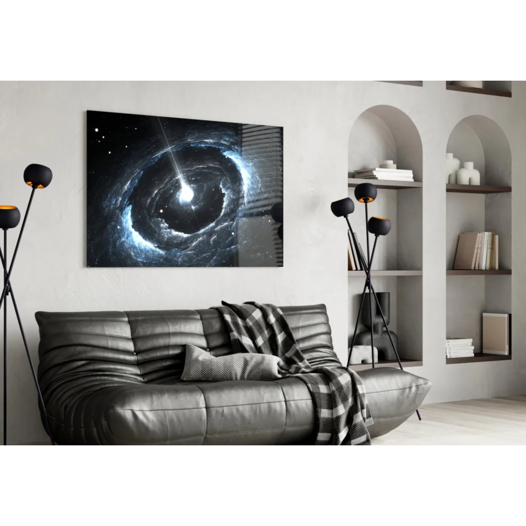 Black leather sofa with tufted cushions and plaid throw under cosmic spiral galaxy wall art
