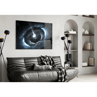Black leather sofa with tufted cushions and plaid throw under cosmic spiral galaxy wall art