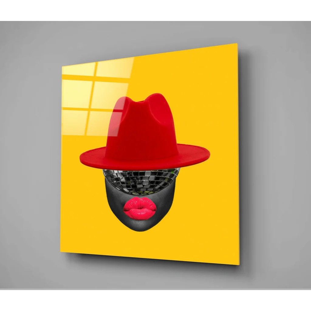 Vibrant glossy red fedora on yellow in glass wall art decor