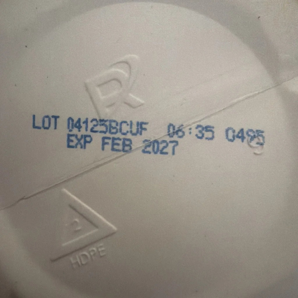Creatine monohydrate lid with rx symbol, lot, exp 02/2027 in blue