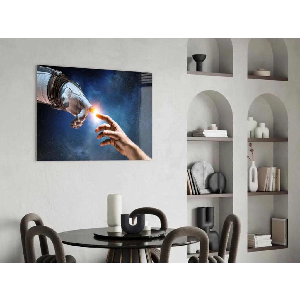 Futuristic glass wall art of astronaut and human hands touching in space