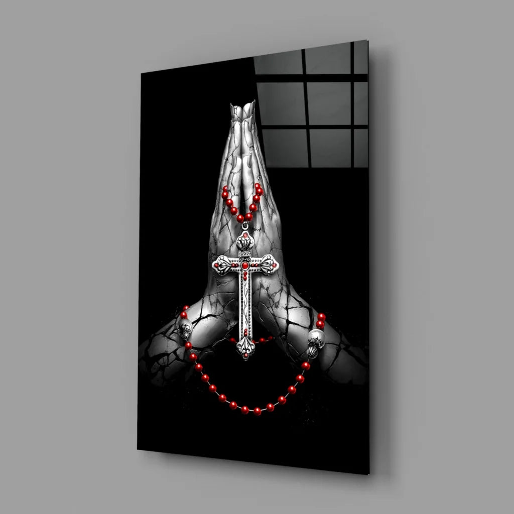 Striking black-and-white praying hands wall art with silver cross and red beads