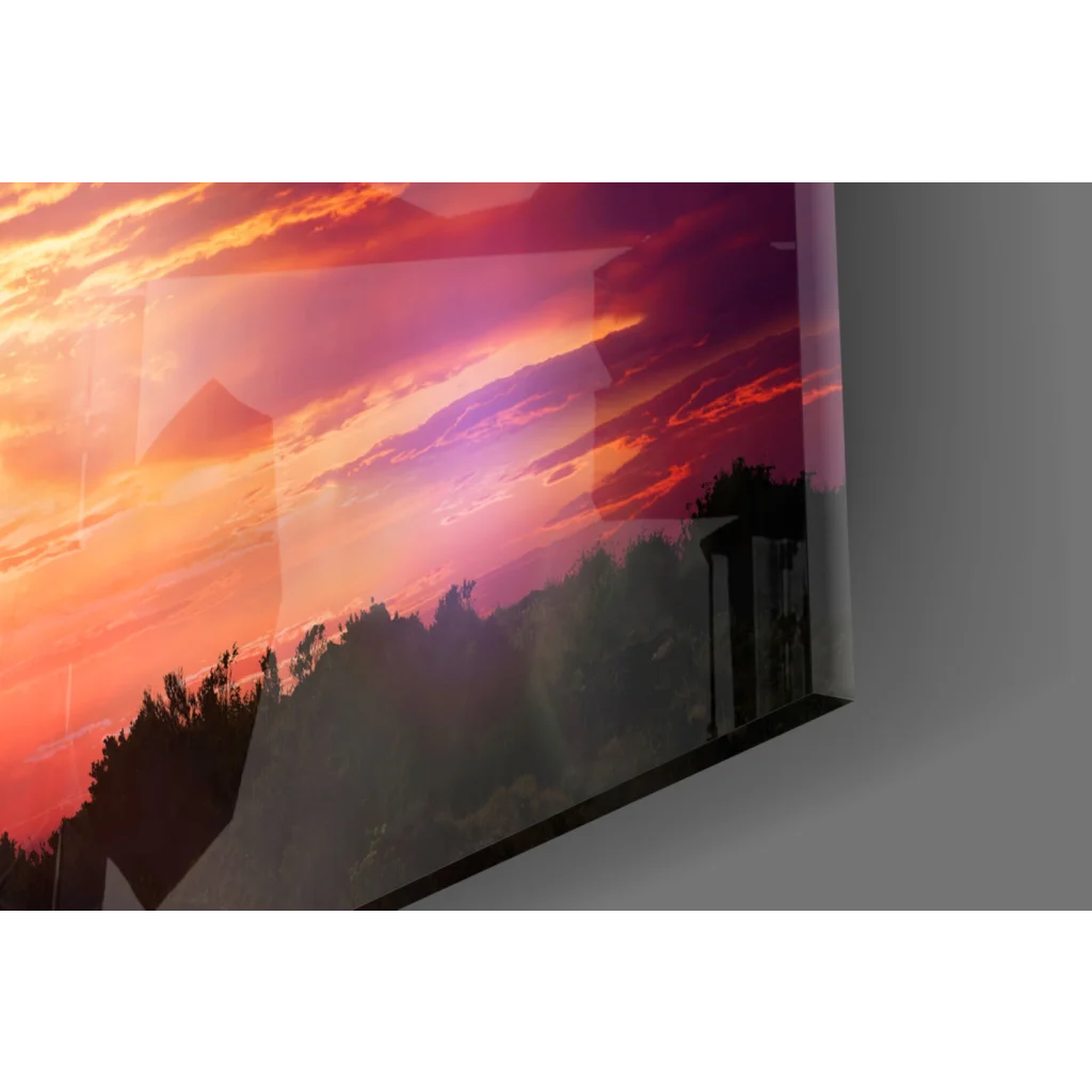Vibrant sunset landscape on glossy glass wall art panel