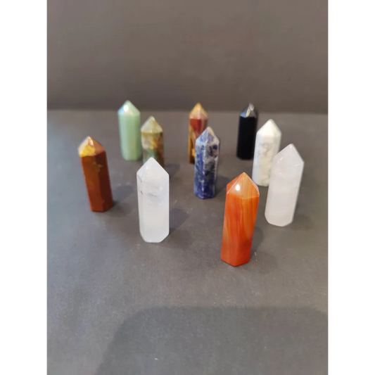Vibrant crystal cut base tower sculpture set in orange, white, blue, green, black