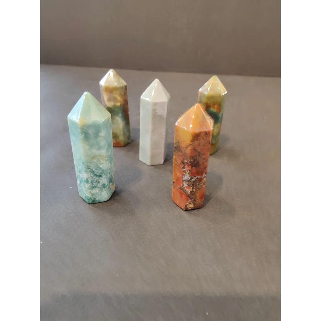 Vibrant crystal cut base tower sculpture set with teal, white, orange points