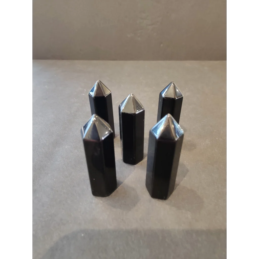 Five sleek black obsidian crystal cut base tower points with silver tips