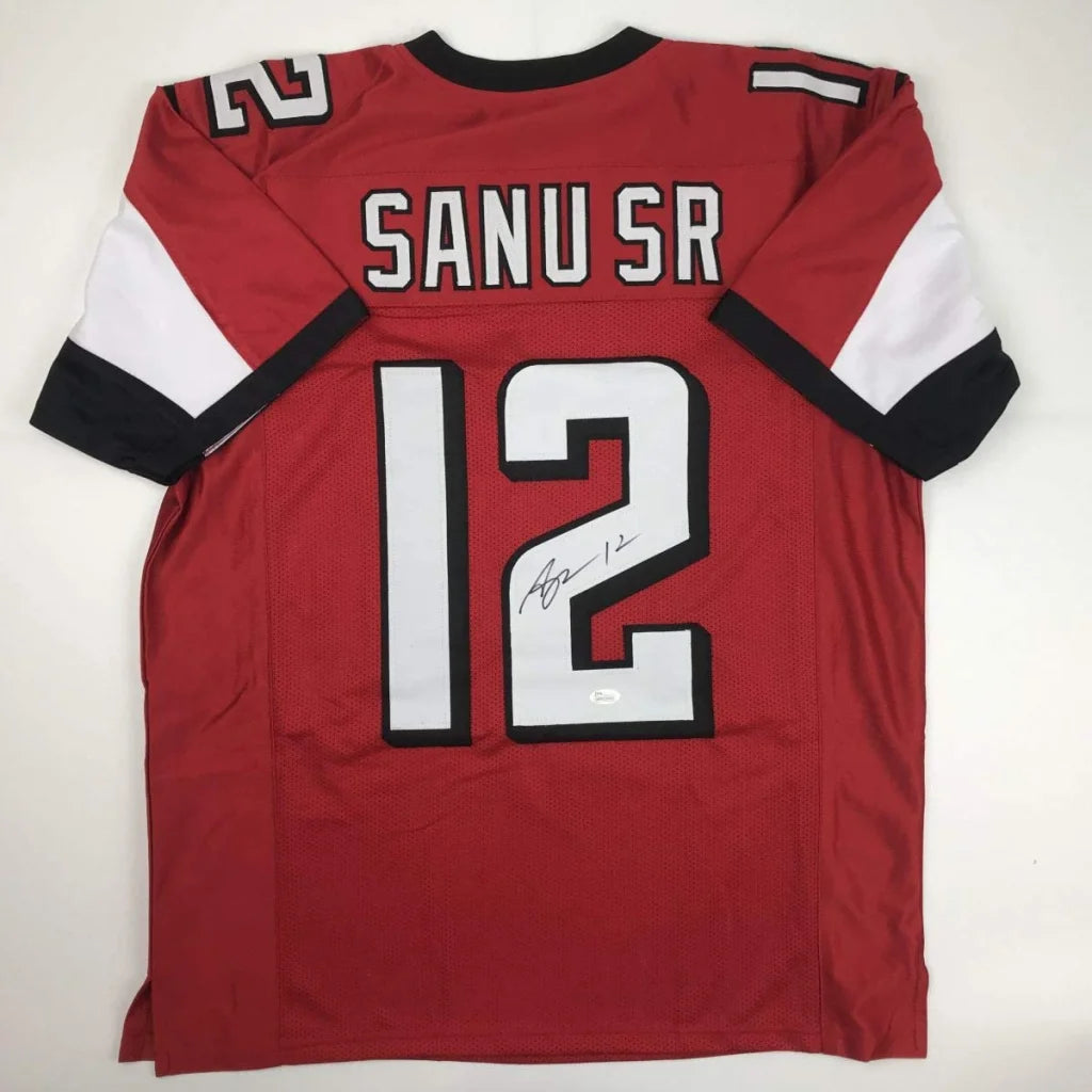 Red custom football jersey with signature, perfect for professional sports fans