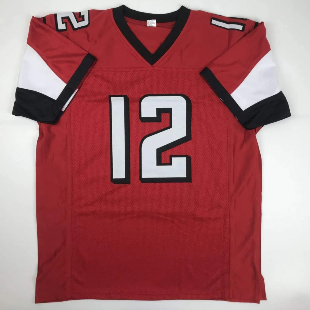 Red custom jersey with number 12, black V-neck, perfect for sports league fans