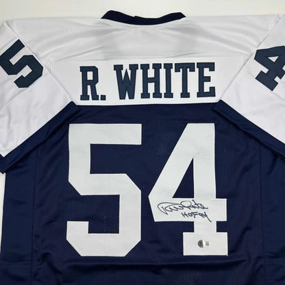 Autographed navy blue and white football jersey with number 54, perfect for professional sports fans