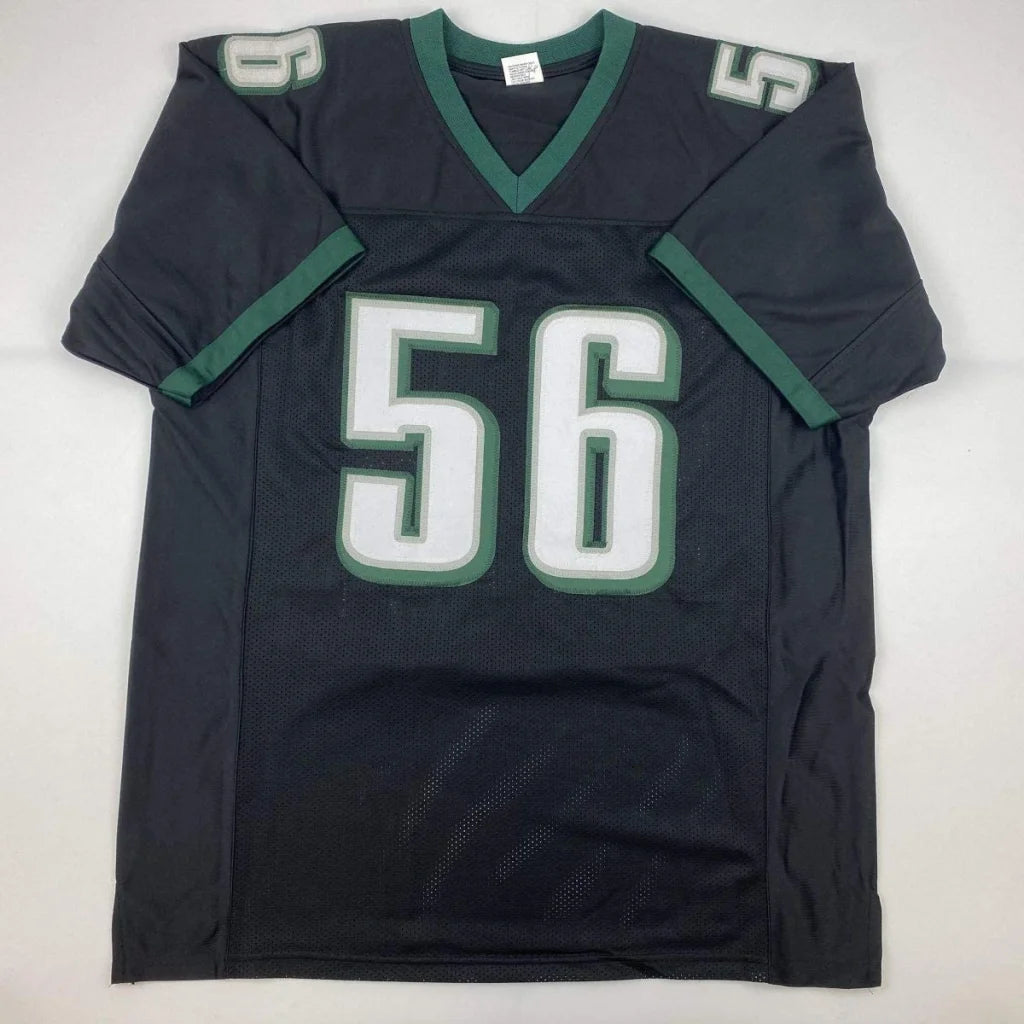 Black and green custom jersey with number 56 from a professional sports league