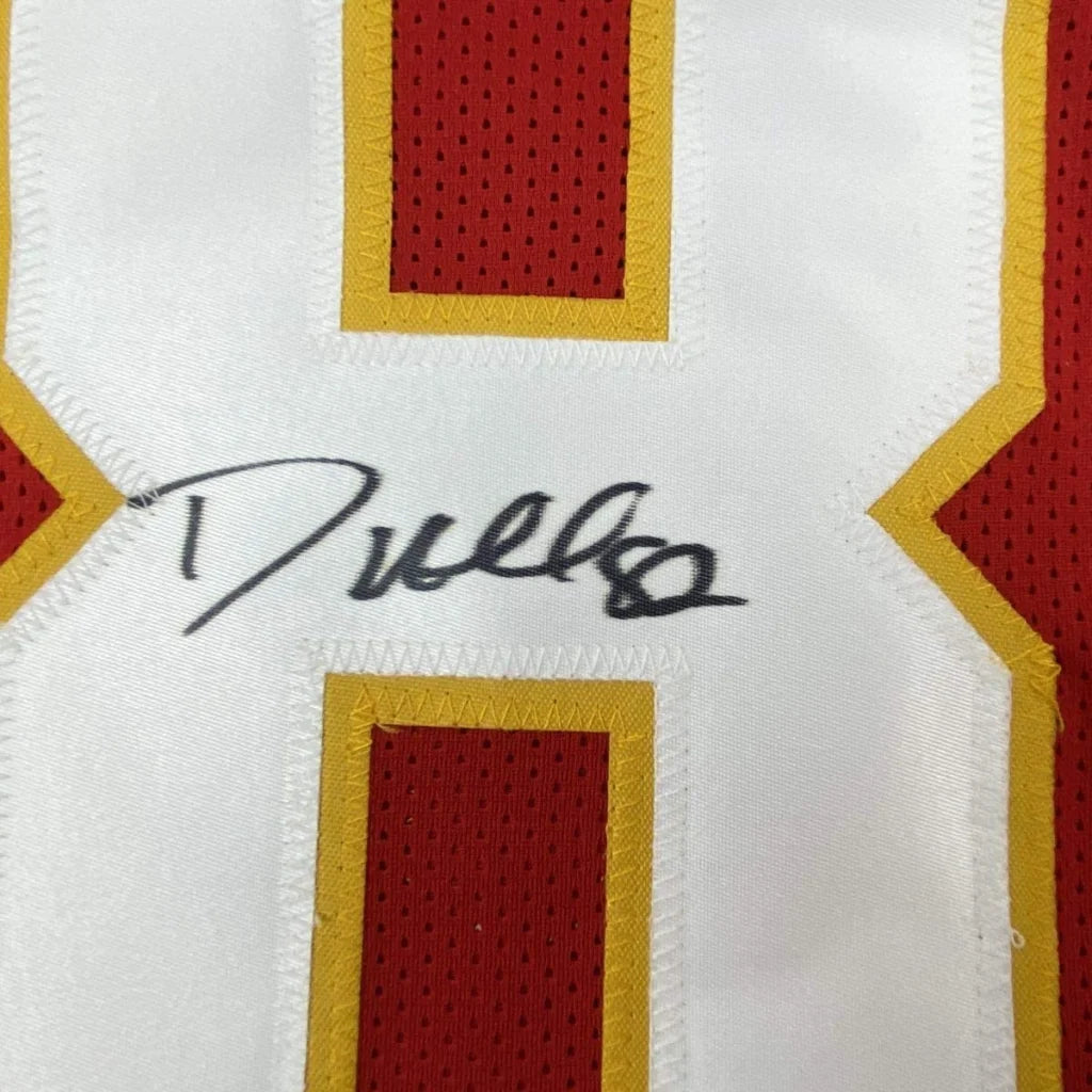 Autographed red and white custom jersey from a pro sports league collectible
