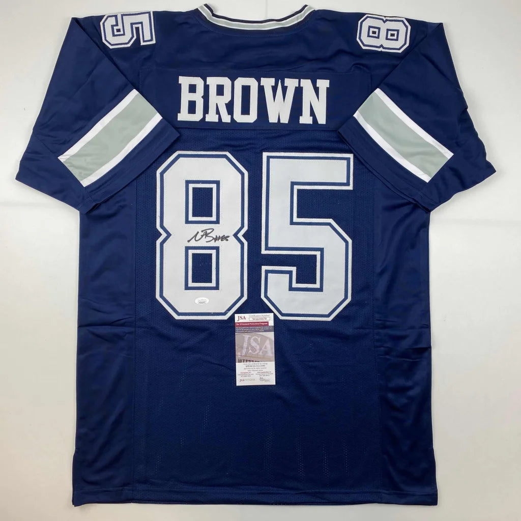 Autographed blue football jersey with number 85 from Dallas Cowboys, perfect for pro sports fans