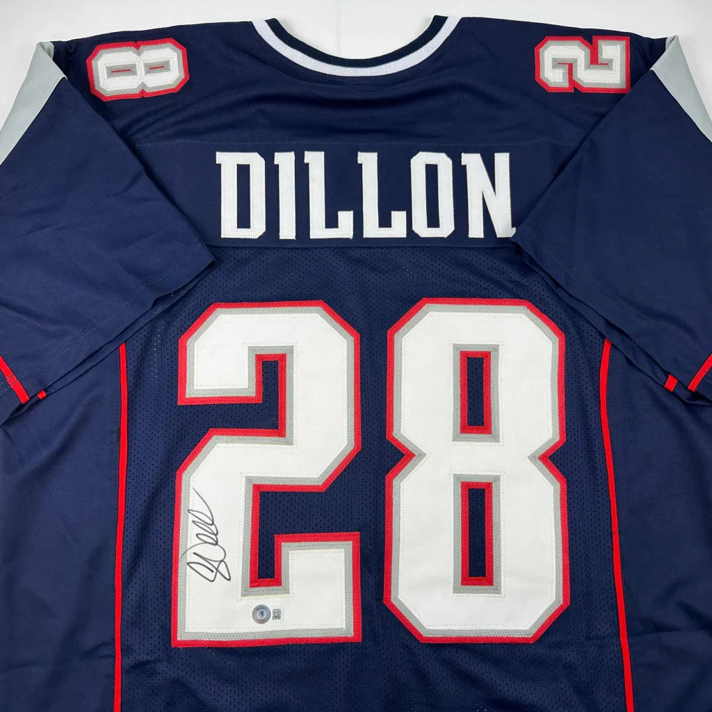 Signed navy blue football jersey with red and white trim from a professional sports league