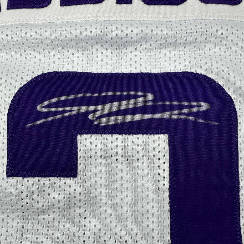 White custom jersey with purple number for professional sports league fans