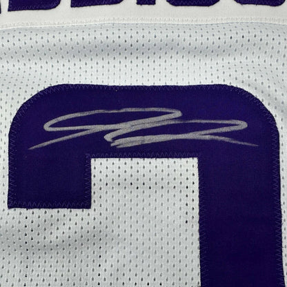 White custom jersey with purple number for professional sports league fans
