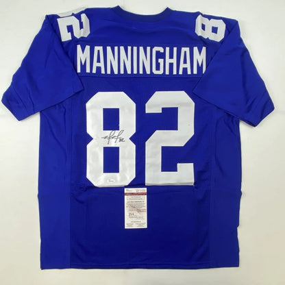 Custom royal blue Manningham 82 football jersey, pro sports league collectible