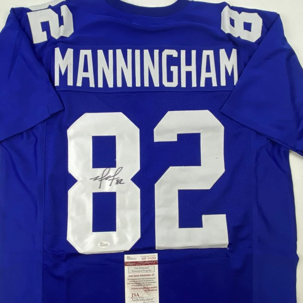 Custom royal blue Manningham 82 football jersey, pro sports league collectible
