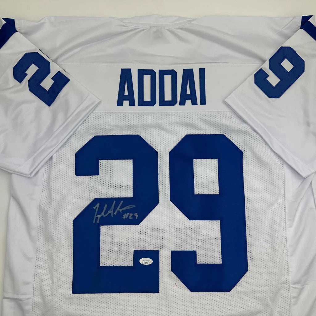 White custom jersey autographed by pro sports star Addai 29