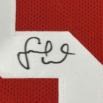 Red and white custom jersey with black autograph, number 54