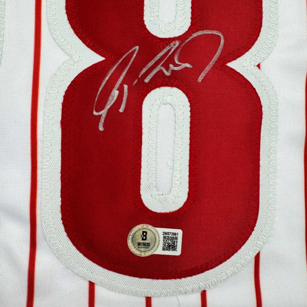 Autographed red and white striped custom jersey, number 28 pro sports league collectible