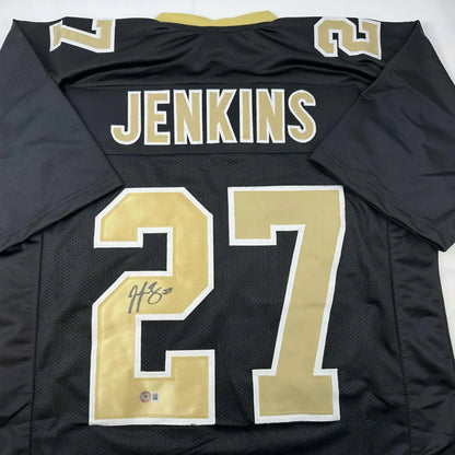 Black gold custom jersey with Jenkins 27, NFL logo, autographed