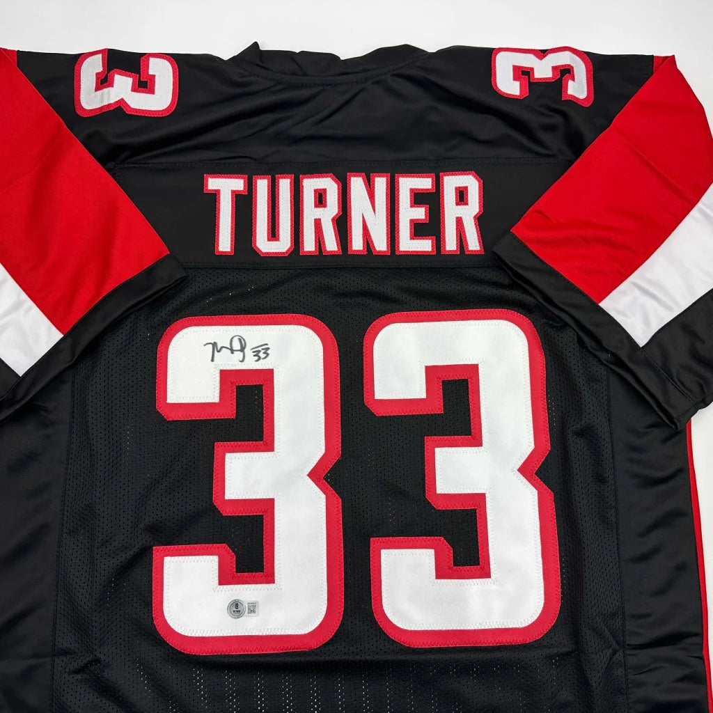 Custom black red Turner jersey in professional sports style