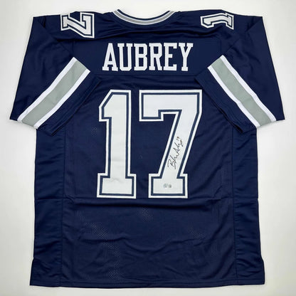 Navy blue custom jersey with white lettering, Aubrey 17, pro sports style
