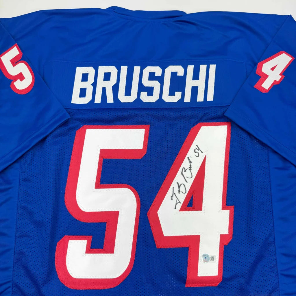 Signed blue custom jersey with Bruschi 54 for football fans and pro sports collectors