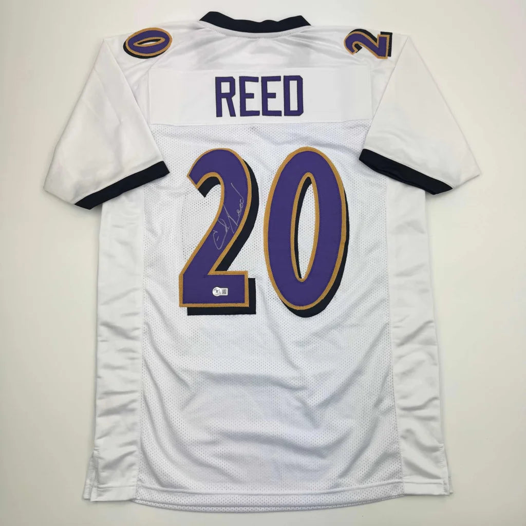 Autographed white football jersey with REED 20 for custom sports league team gear
