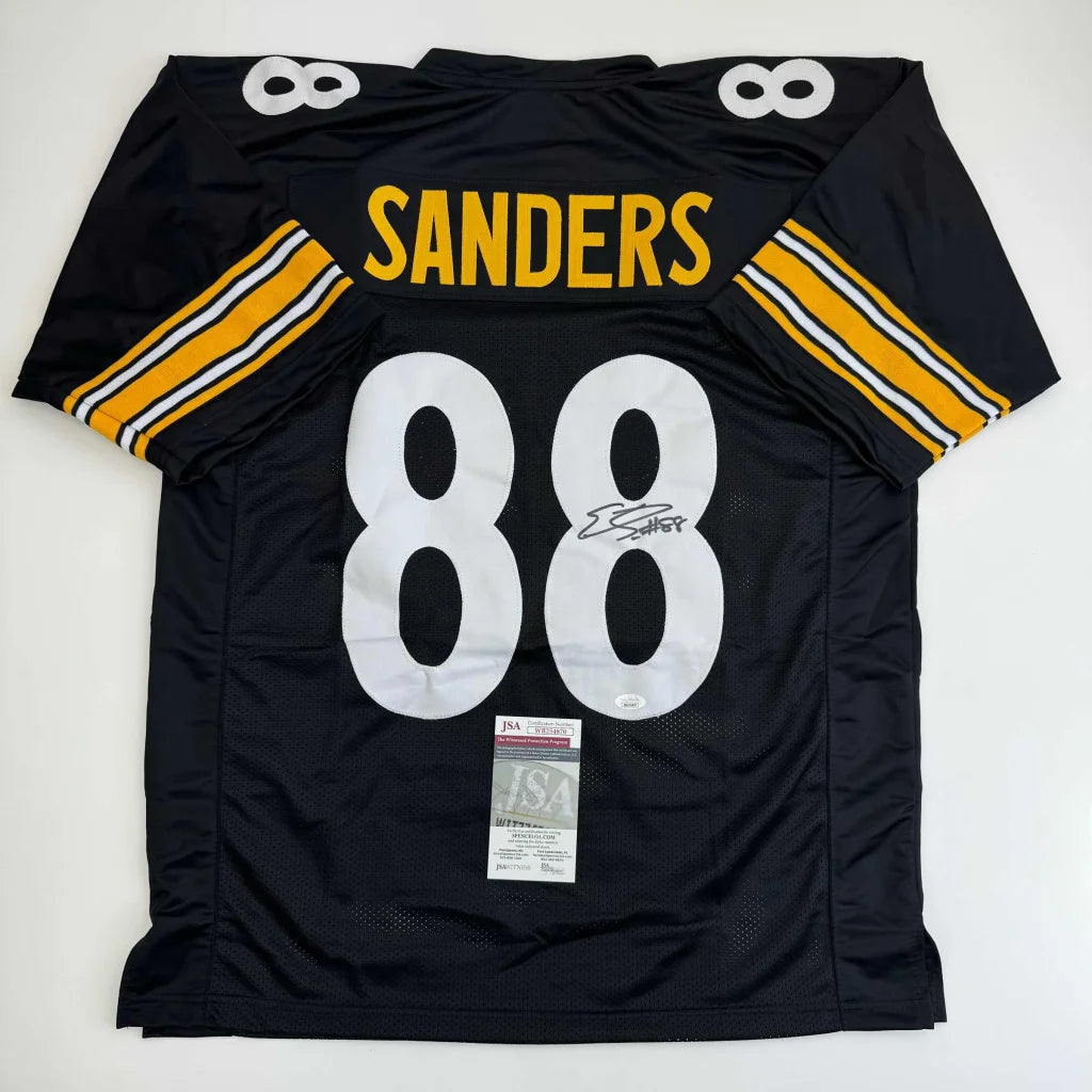 Black and gold custom jersey with number 88 and signature from professional sports league