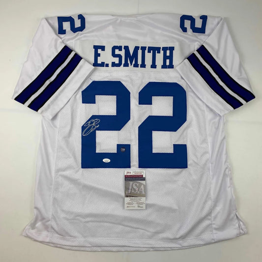 Autographed white football jersey with blue stripes and number 22 from a professional sports league