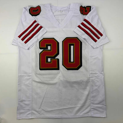 White custom jersey with red and gold accents from the Hearst 20 Autographed Football Collectible for sports fans