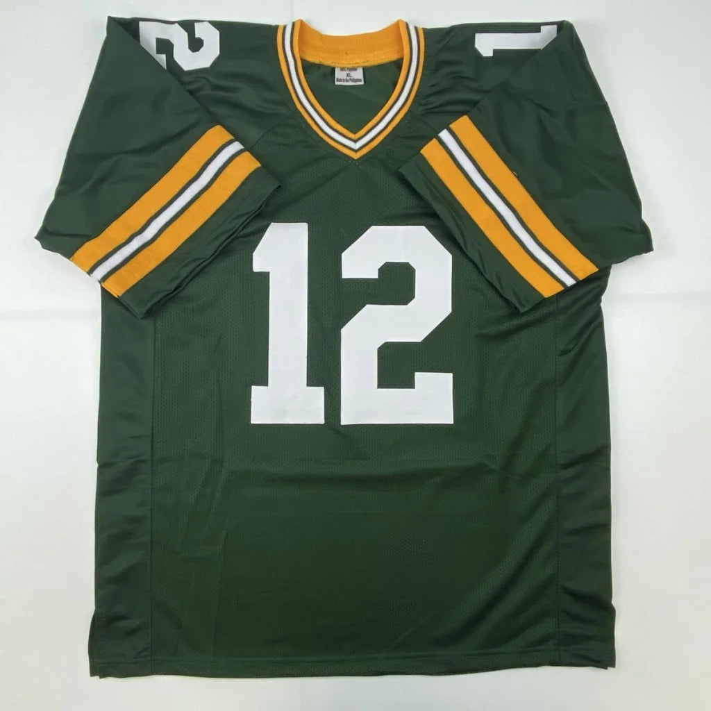 Green and gold custom jersey with number 12 from professional sports league and Lynn Dickey