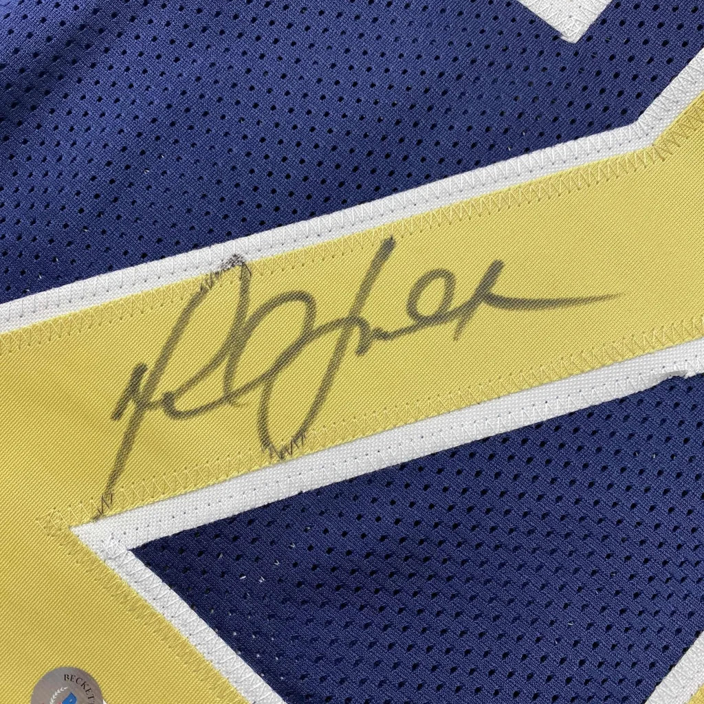 Autographed dark blue custom jersey with gold and white trim from professional sports league