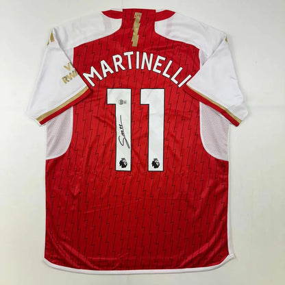 Red and white custom jersey with MARTINELLI 11 for Arsenal, perfect for professional sports fans