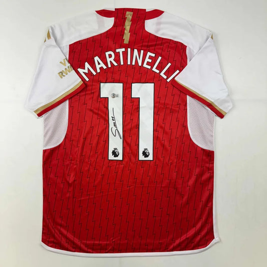 Red and white custom jersey with MARTINELLI 11 for Arsenal, perfect for professional sports fans
