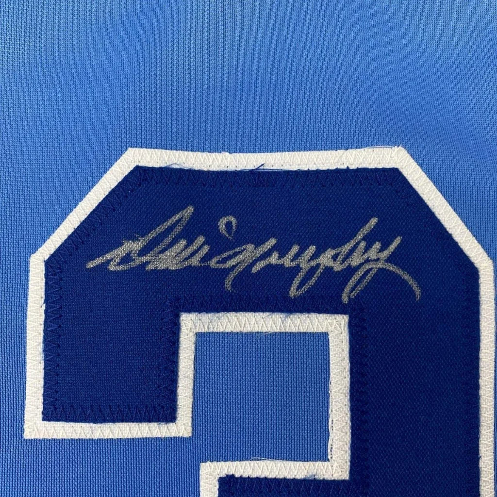 Blue custom jersey with autograph from a professional sports league player